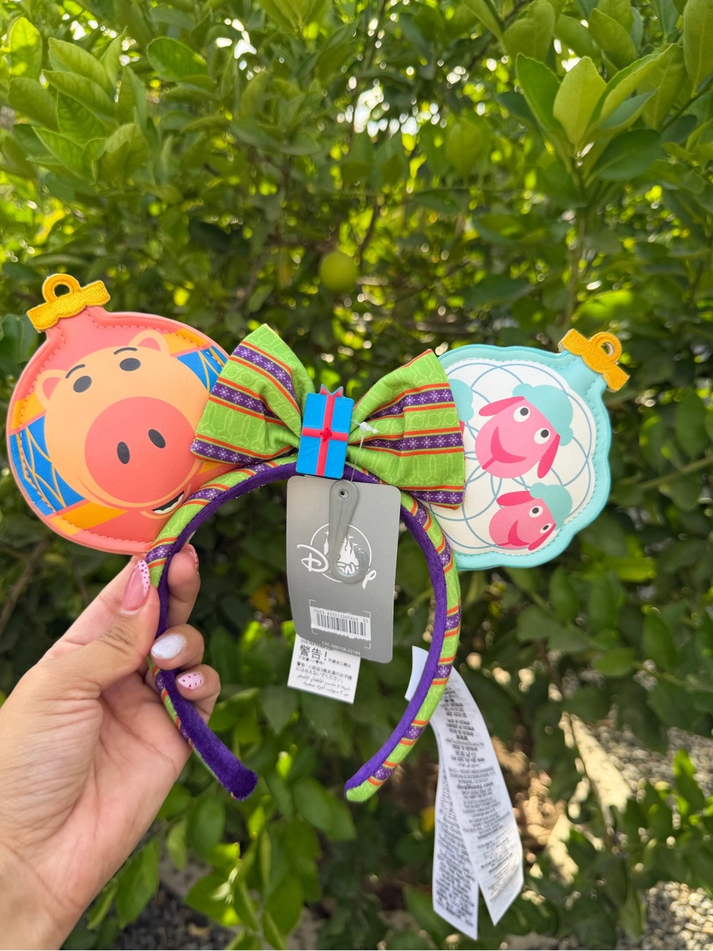 Disney Purple Headband with Orange Hamm and Teal Alien Ornament Ears